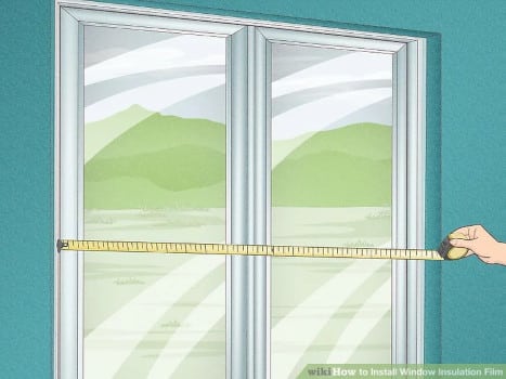 Mesure de la taille de la fenêtre avant la pose du survitrage